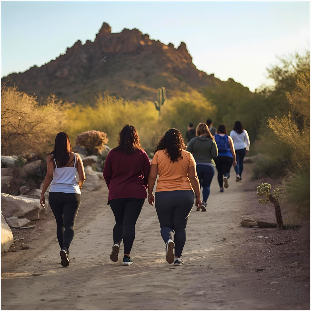 Group of thicker women walking along Arizona desert hiking trail