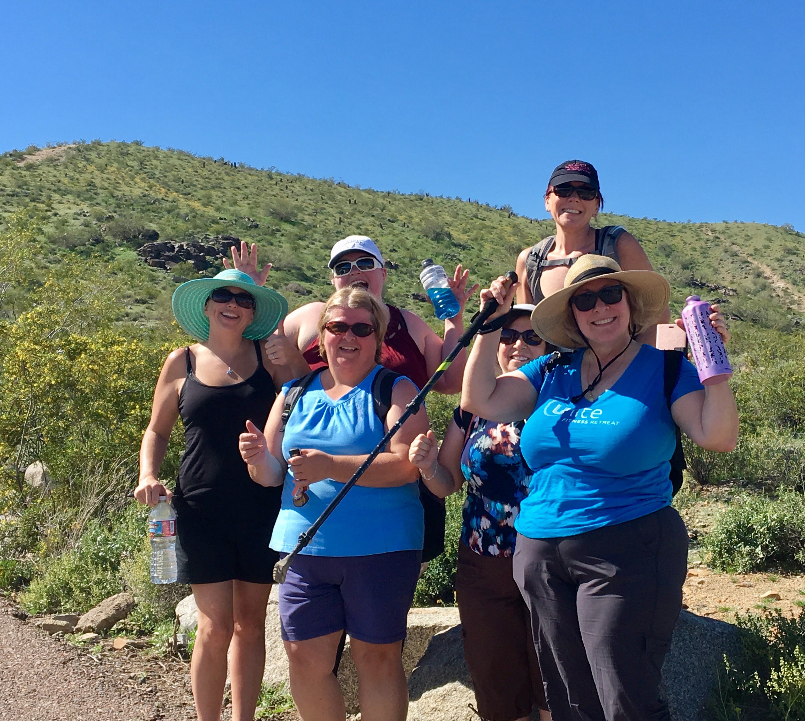 Chubby Chicks Fitness members hiking together in Arizona.